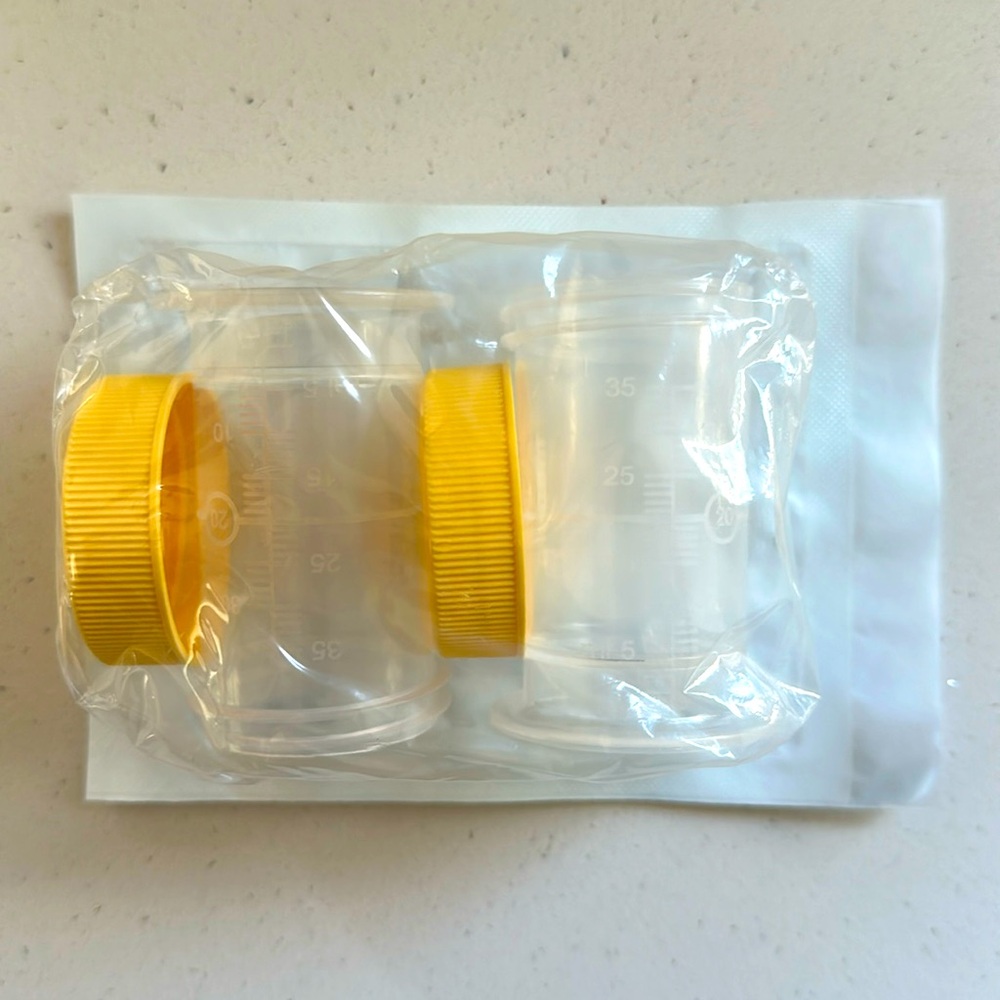 NWT medela colostrum collection and storage containers. Medela pump compatible.